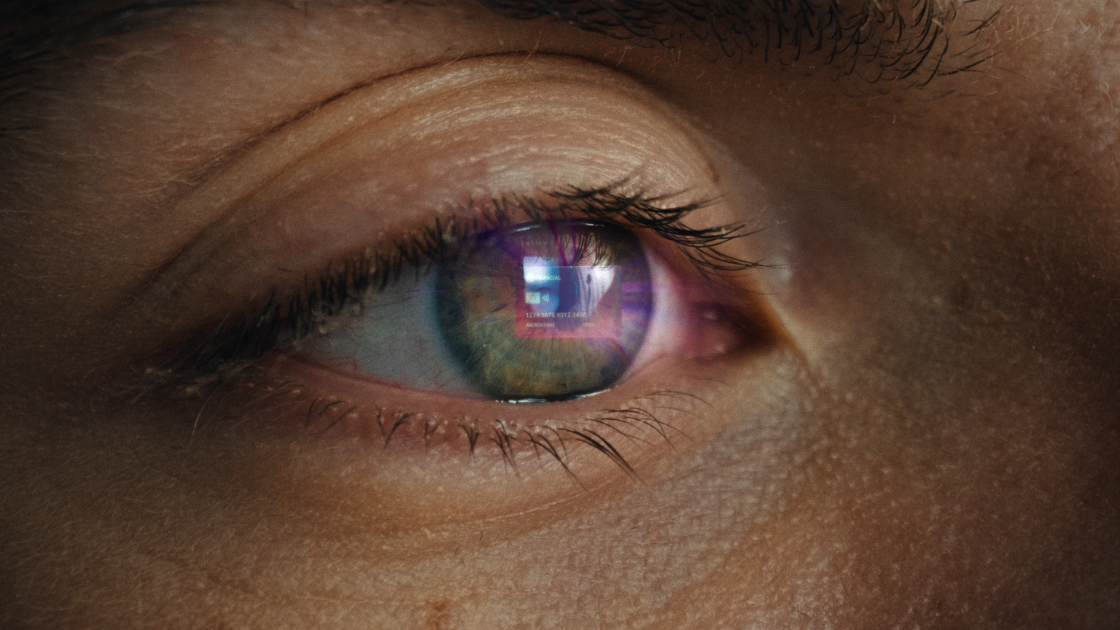 A cinematic macro shot reveals digital finance reflected in the eye, blending emotion with futuristic storytelling in video production.