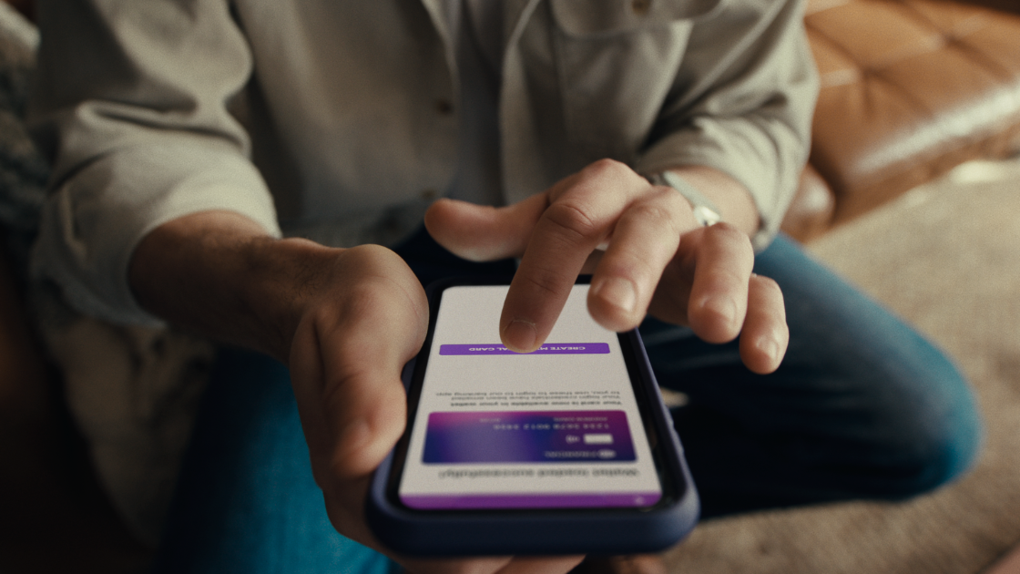 Dynamic handheld videography captures the user experience of managing digital payments on a smartphone.
