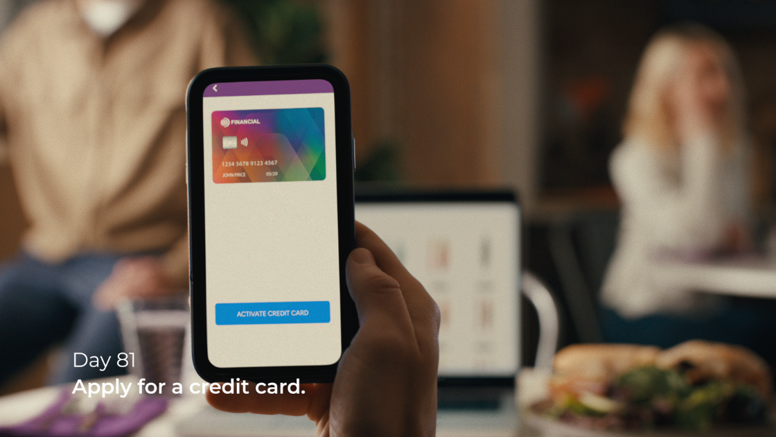 This branded lifestyle frame illustrates mobile credit card activation, demonstrating product UX through cinematic storytelling.